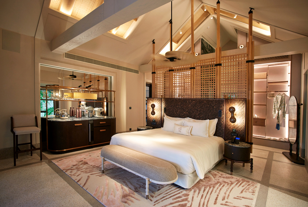 A stately bedroom in the four-bedroom Beach Residence